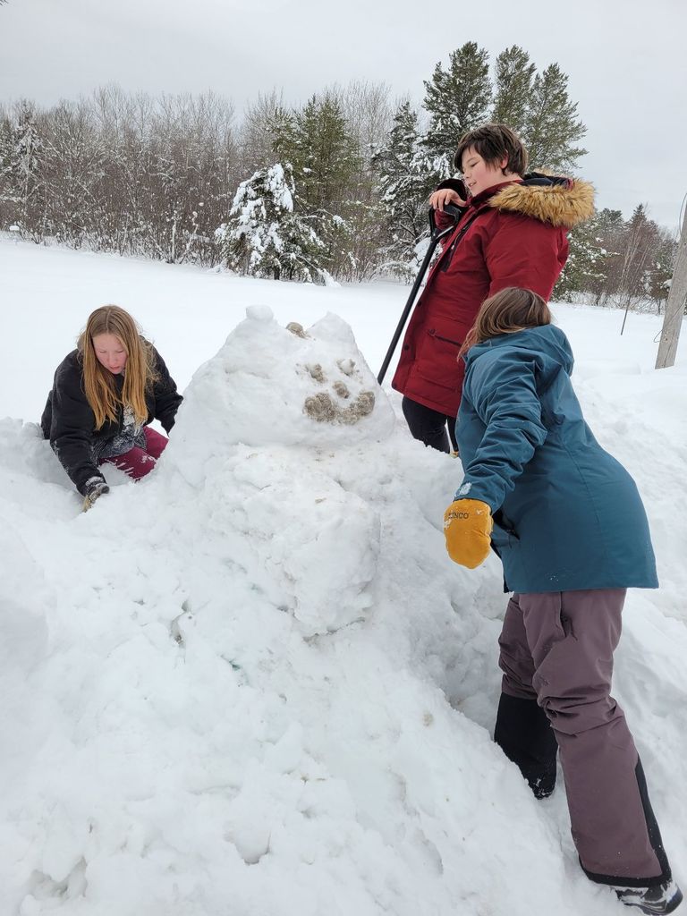 NLCS students making snow sculptures 2